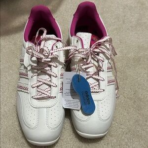 Adidas Women's White Sneakers with Pink Highlights